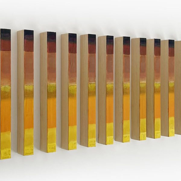 Plágaro. Ref. P028. Identical Papers, 2024. Mixed media on 640 g Indian rag paper on wood. Set of 18 units. 58 x 175 x 7 cm. Different positions.